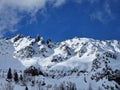 Bright sunny mountain range in French Alps above Chamonix ski resort Royalty Free Stock Photo