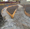 Building new concrete pavement the garden. Foundation for paving Royalty Free Stock Photo