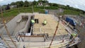 Building new homes at a construction site in Ireland including roofers joiners builders painters labourers, aerial photo Royalty Free Stock Photo