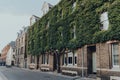 Building on New Inn Hall Street in Oxford, UK, covered in green tree foliage Royalty Free Stock Photo