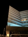 building in the night, hotel near the beach, sharp forms of architecture Royalty Free Stock Photo