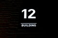 Building number 12. Numberplate