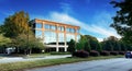 Generic Commercial Office Building with blue skies and space for copy. Royalty Free Stock Photo