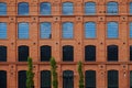 A red brick wall, a revitalized building of a former factory. Royalty Free Stock Photo