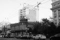 The building of an old merchant trading house on the background of a new building.