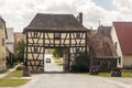 Building over the road in rural Germany village. Old house as ex