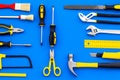 Building, painting and repair tools for house constructor work place set blue background top view pattern Royalty Free Stock Photo