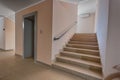 Building panel house interior with elevator and flight stairs. Precast concrete staircase. Flight of stairs. Flight of