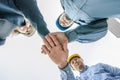 building, partnership, gesture and people concept , stacking hands express their teamwork and cooperation Royalty Free Stock Photo