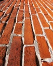 Building, pattern and closeup of red, brick wall for texture, background and design of exterior structure. Architecture Royalty Free Stock Photo