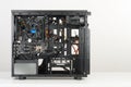 Building of PC, ATX motherboard inserted to black computer midi