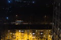 Building with people silhouettes in windows.People waite bus on busstop with traffic light. Aerial panoramic view from tower Royalty Free Stock Photo