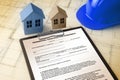 BUILDING PERMIT CONCEPT WITH HOME MODEL and approved work permission for the construction of a new building Royalty Free Stock Photo
