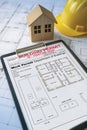 BUILDING PERMIT CONCEPT WITH HOME MODEL and approved work permission for the construction of a new building Royalty Free Stock Photo
