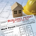 BUILDING PERMIT CONCEPT WITH HOME MODEL and approved work permission for the construction of a new building Royalty Free Stock Photo