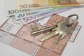 Building plan with keys and money Royalty Free Stock Photo