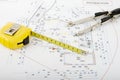 Building plan with pair of compasses and rolling m Royalty Free Stock Photo