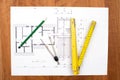 Building plan with pencil, folding yardstick and compass Royalty Free Stock Photo