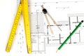 Building plan with pencil, folding yardstick and compass Royalty Free Stock Photo