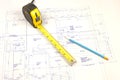 Building plans and tape measure Royalty Free Stock Photo