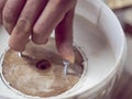 Building plaster with wood pattern. gypsum hardens in a bucket