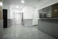 Building portal with metal mailboxes, granite floors and gray elevator Royalty Free Stock Photo
