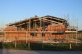 Building red brick wall new village community hall Royalty Free Stock Photo