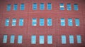 Building red bricks wall windows panoramic office exterior Royalty Free Stock Photo