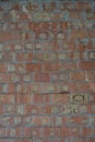 Building red embossed brick, building brick wall, structural background. Royalty Free Stock Photo