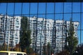 Building reflected in the glass of other buildings Royalty Free Stock Photo