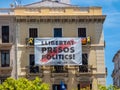 Building in Reus, Spain with political placard on the balcony