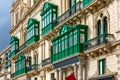 Building`s facade with traditional balconies in Valletta, Malta Royalty Free Stock Photo