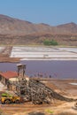 Building at Salinas de Pedra de Lume, old salt lakes with people swimming in the water on Sal Island, Cape Verde Royalty Free Stock Photo