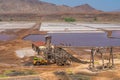 Building at Salinas de Pedra de Lume, old salt lakes with people swimming in the water on Sal Island, Cape Verde Royalty Free Stock Photo