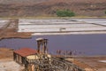 Building at Salinas de Pedra de Lume, old salt lakes with people swimming in the water on Sal Island, Cape Verde Royalty Free Stock Photo