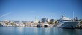 The building of the seaport of Sochi Russia and the pier with boats on a clear Sunny day October 15 2019