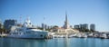 The building of the seaport of Sochi Russia and the pier with boats on a clear Sunny day October 15 2019