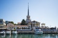 The building of the seaport of Sochi Russia and the pier with boats on a clear Sunny day October 15 2019