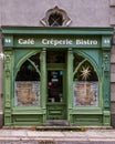 a building with a sign that reads cafe creperie bistro