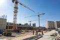 Building site with cranes and blue sky Royalty Free Stock Photo