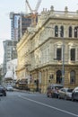 Building site cranes, Classical facades and modern tall buildings at downtown, Wellington, New Zealand