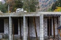 Building Site With House Under Construction. Small and affordable houses constructed with concrete hollow blocks Royalty Free Stock Photo