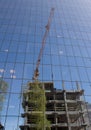 Building Site mirrored in Glass Facade Royalty Free Stock Photo