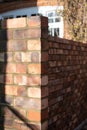 Building site: trowel, bricks and mortar for brickwork, part of a renovation of an Edwardian suburban house in north London, UK