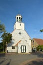 Building of small protestant church called `Hervormde Kerkchurch` on island Texel Royalty Free Stock Photo