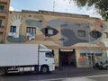 Building with street art frescoes in the Ostiense district to Rome in Italy.