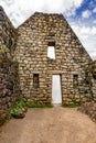 Building structure in Incas city of Machu Picchu in Peru Royalty Free Stock Photo