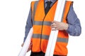 Building Surveyor in orange visibility vest carrying construction plans Royalty Free Stock Photo