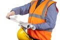 Building Surveyor in orange visibility vest checking construction plans Royalty Free Stock Photo