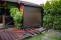 Building a terrace in the garden. DIY tools. Tool shed in the background Royalty Free Stock Photo